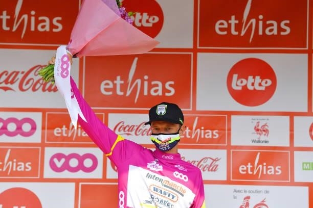 Quinten Hermans of Belgium and Team Intermarché - Wanty - Gobert Matériaux Purple Intermediated Sprint Jersey celebrates at podium during the 42nd...