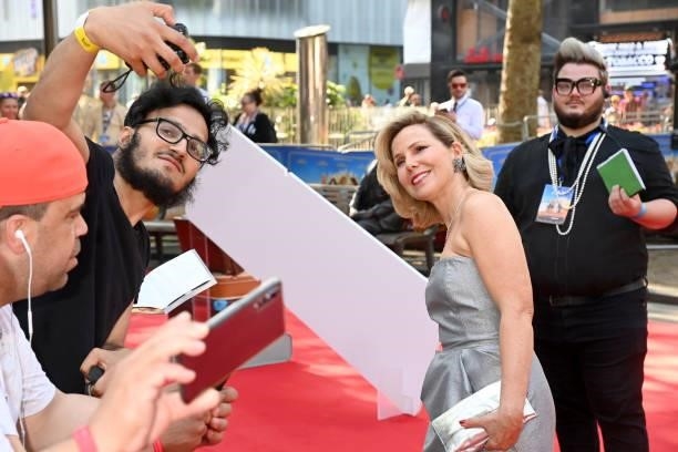 Sally Phillips poses for a selfie with fans at the "Off The Rails