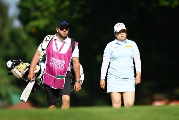 Inbee Park of South Korea and Caddie on hole 18 during day one of the The Amundi Evian Championship at Evian Resort Golf Club on July 22, 2021 in...