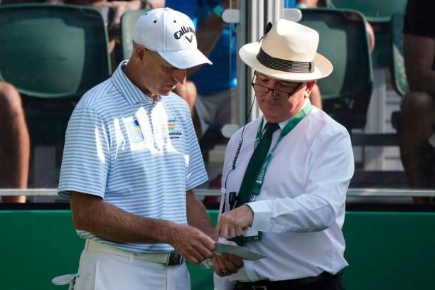 Jim Furyk of United States talks to the Official Starter during the first round of the Senior Open presented by Rolex at Sunningdale Golf Club on...