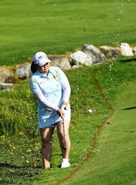 Inbee Park of South Korea plays from the water on hole 18 during day one of the The Amundi Evian Championship at Evian Resort Golf Club on July 22,...