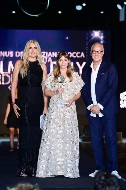 Tiziana Rocca, Elizabeth Olsen and Daniel Frigo attend the Filming Italy Festival at Forte Village Resort on July 22, 2021 in Santa Margherita di...