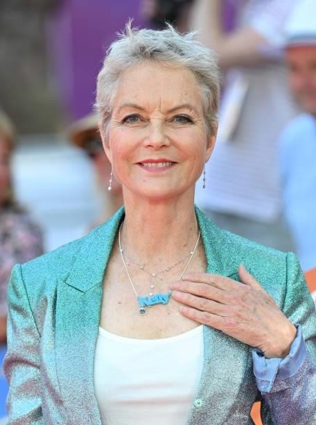 Jenny Seagrove wears a necklace in tribute to actress Kelly Preston, who died of breast cancer in 2020, as she attends the "Off The Rails