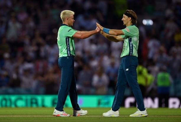 Sam Curran and Tom Curran of Oval Invincibles celebrates winning the Hundred match between Oval Invincibles and Manchester Originals at The Kia Oval...