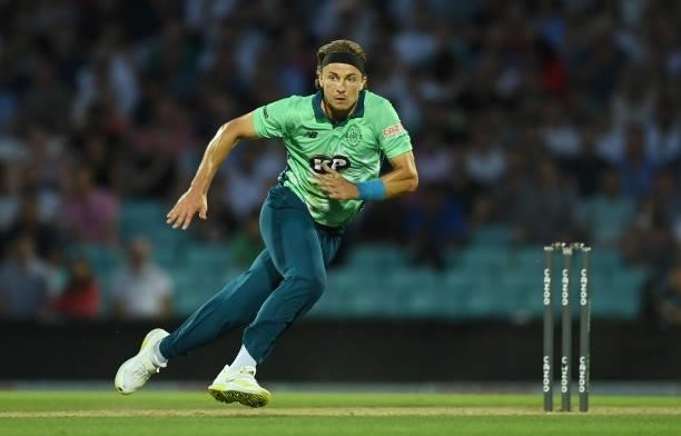 Tom Curran of Oval Invincibles runs during the Hundred match between Oval Invincibles and Manchester Originals at The Kia Oval on July 22, 2021 in...