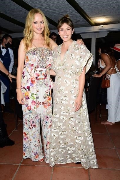 Heather Graham and Elizabeth Olsen attend the Filming Italy Festival at Forte Village Resort on July 22, 2021 in Santa Margherita di Pula, Italy.