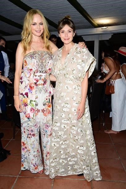 Heather Graham and Elizabeth Olsen attend the Filming Italy Festival at Forte Village Resort on July 22, 2021 in Santa Margherita di Pula, Italy.