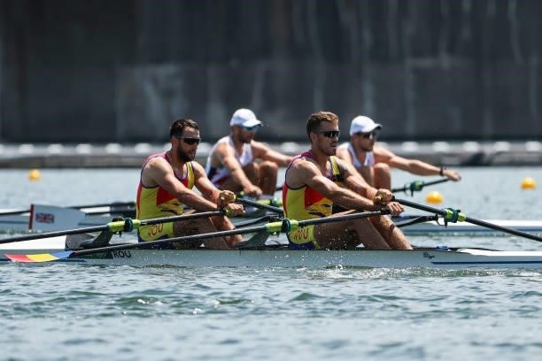 Ioan Prundeanu and Marian Enache of Team Romania and Graeme Thomas and John Collins of Team Great Britain compete during the Men’s Double Sculls Heat...