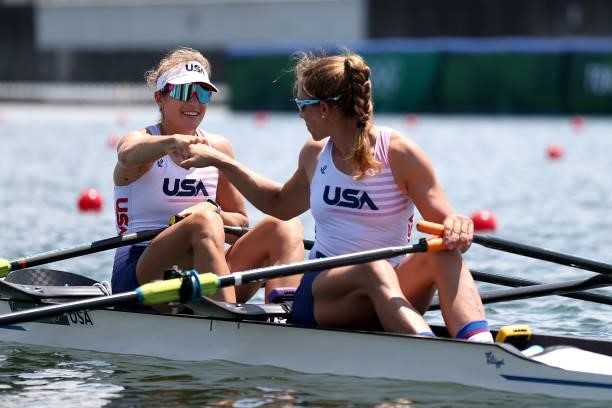 Kristina Wagner and Genevra Stone of Team United States fist bump prior to the Women’s Double Sculls Heat 1 on Day 0 of the Tokyo 2020 Olympic Games...