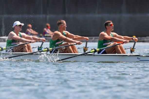 Martynas Dziaugys, Dovydas Nemeravicius and Dominykas Jancionis of Team Lithuania compete during the Men’s Quadruple Sculls Heat 1 on Day 0 of the...