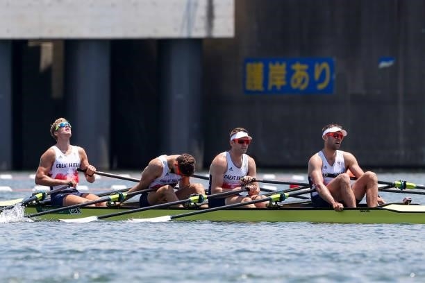 Jack Beaumont, Tom Barras, Angus Groom and Harry Leask of Team Great Britain react during the Men’s Quadruple Sculls Heat 1 on Day 0 of the Tokyo...