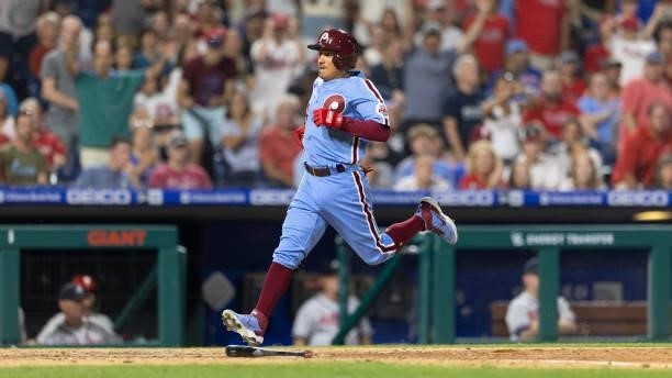 Ronald Torreyes of the Philadelphia Phillies scores a run against the Atlanta Braves at Citizens Bank Park on July 22, 2021 in Philadelphia,...