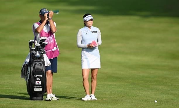 So Yeon Ryu of South Korea waits with their caddie on the 11th hole during day two of the The Amundi Evian Championship at Evian Resort Golf Club on...