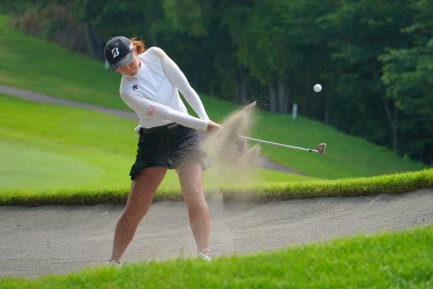 Ayaka Watanabe of Japan hits out from a bunker on the 4th hole during the second round of Daito Kentaku eHeyanet Ladies at Takino Country Club on...