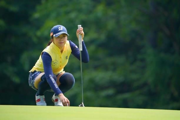 Kotone Hori of Japan lines up a putt on the 4th green during the second round of Daito Kentaku eHeyanet Ladies at Takino Country Club on July 23,...
