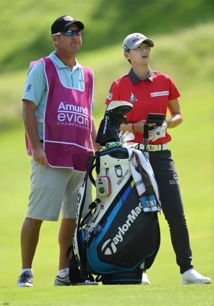 Sung Hyun Park of South Korea talks to their caddie on the 4th hole during day two of the The Amundi Evian Championship at Evian Resort Golf Club on...