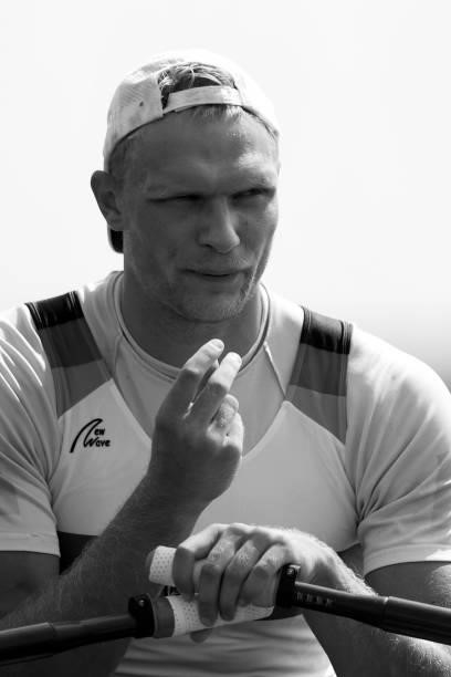 Oliver Zeidler of Team Germany blows his fingers at the start line ahead of the Men’s Single Sculls Heat 6 during the Tokyo 2020 Olympic Games at Sea...