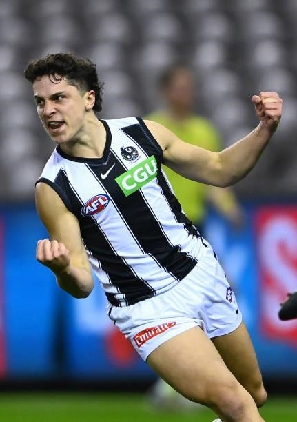 Trent Bianco of the Magpies celebrates kicking a goal during the round 19 AFL match between Port Adelaide Power and Collingwood Magpies at Marvel...