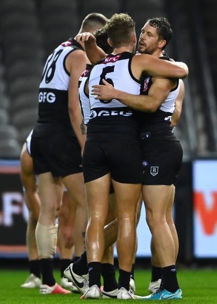 Travis Boak of the Power is hugged by Dan Houston of the Power after winning the round 19 AFL match between Port Adelaide Power and Collingwood...