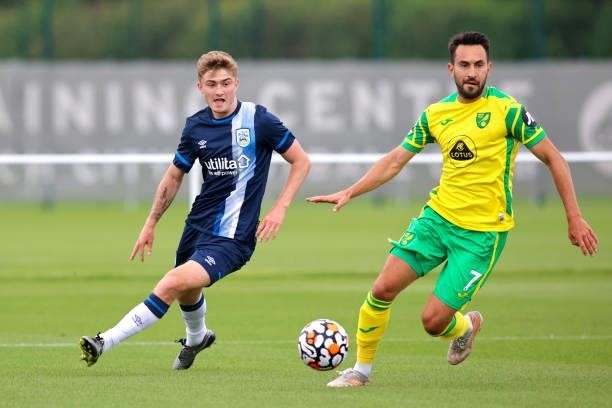 Scott High of Huddersfield Town and Lukas Rupp of Norwich City battle during the pre-season friendly between Norwich City and Huddersfield Town on...