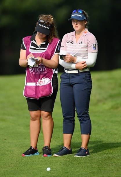 Brooke Henderson of Canada looks on with their caddie on the 18th hole during day two of the The Amundi Evian Championship at Evian Resort Golf Club...
