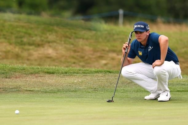 John Catlin of USA lines up his putt on the seventh hole during Day Two of the Cazoo Open supported by Gareth Bale at Celtic Manor Resort on July 23,...