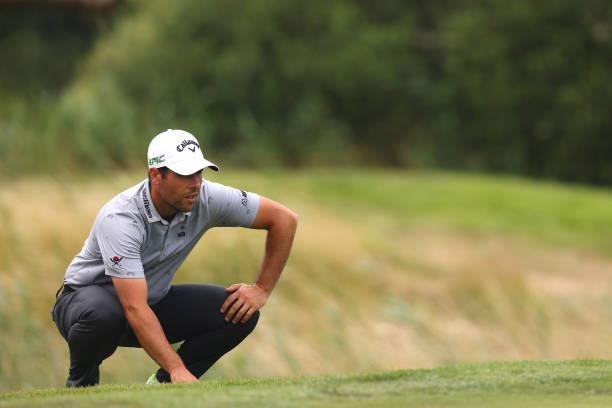 Adrian Otaegui of Spain lines up his putt on the seventh hole during Day Two of the Cazoo Open supported by Gareth Bale at Celtic Manor Resort on...