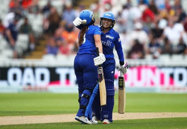 Dani Gibson and Amara Carr of London Spirit celebrate hitting the winning runs for victory during The Hundred game between Birmingham Phoenix and...