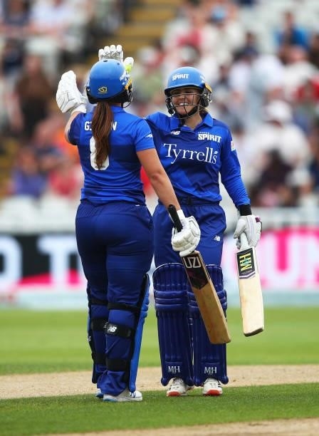 Dani Gibson and Amara Carr of London Spirit celebrate hitting the winning runs for victory during The Hundred game between Birmingham Phoenix and...
