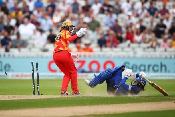 Charlie Dean of London Spirit is run out by Amy Jones of Birmingham Phoenix during The Hundred game between Birmingham Phoenix and London Spirit at...