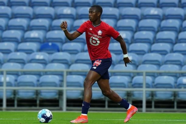 Tiago Djalo of LOSC Lille runs with the ball during the Pre-Season Friendly match between SL Benfica and Lille at Estadio Algarve on July 22, 2021 in...