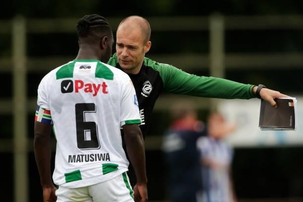 Headcoach Danny Buijs of FC Groningen gives instructions to Azor Matusiwa during the Club Friendly match between SC Heerenveen and FC Groningen at...