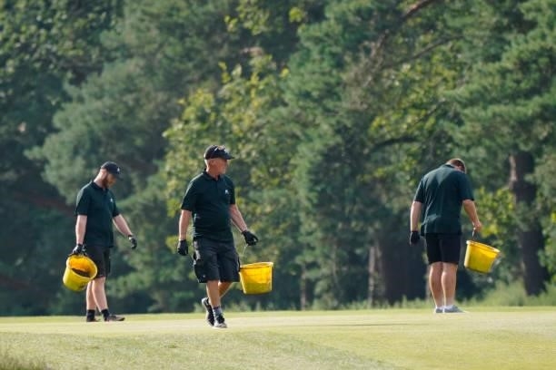 Green staff divoting during the second round of the Senior Open presented by Rolex at Sunningdale Golf Club on July 23, 2021 in Sunningdale, England.