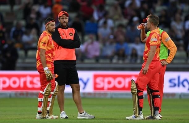 Birmingham Phoenix coach Daniel Vettori speaks to his team during a time out during The Hundred match between Birmingham Phoenix and London Spirit at...