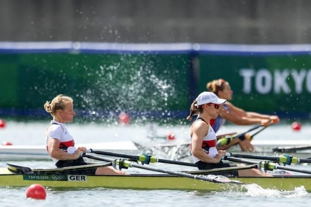 Annekatrin Thiele and Leonie Menzel of Team Germany compete during the Women's Double Sculls Repechage 1 on day one of the Tokyo 2020 Olympic Games...