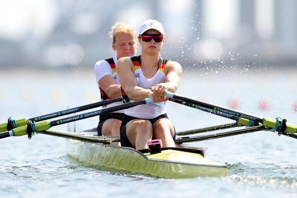 Leonie Menzel and Annekatrin Thiele of Team Germany compete during the Women's Double Sculls Repechage 1 on day one of the Tokyo 2020 Olympic Games...