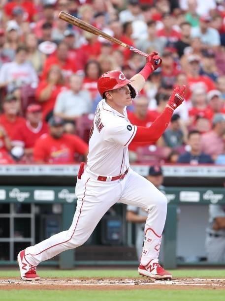 Tyler Stephenson of the Cincinnati Reds hits a single in the first inning against the St. Louis Cardinals at Great American Ball Park on July 23,...