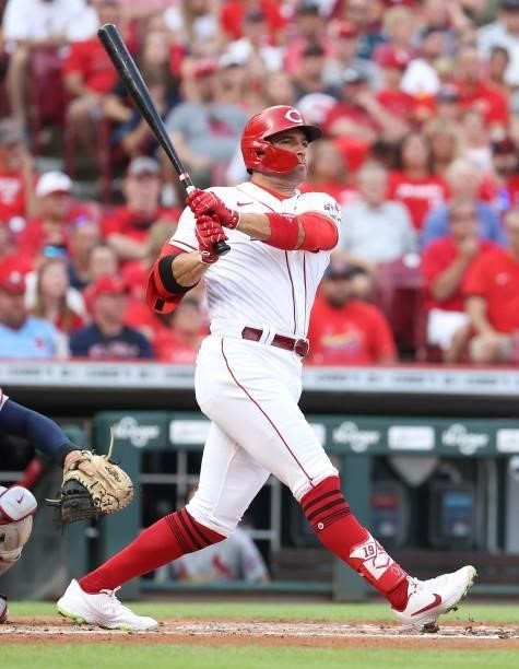 Joey Votto of the Cincinnati Reds hits a two run RBI double in the first inning against the St. Louis Cardinals at Great American Ball Park on July...