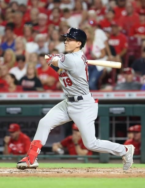 Tommy Edman of the St. Louis Cardinals hits a single against the Cincinnati Reds in the sixth inning at Great American Ball Park on July 23, 2021 in...