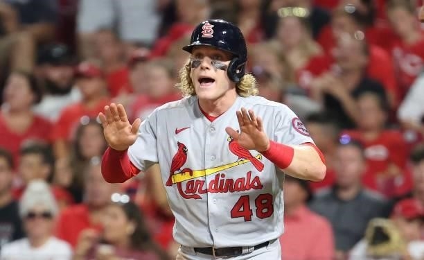 Harrison Bader of the St. Louis Cardinals celebrates after scoring against the Cincinnati Reds in the sixth inning at Great American Ball Park on...