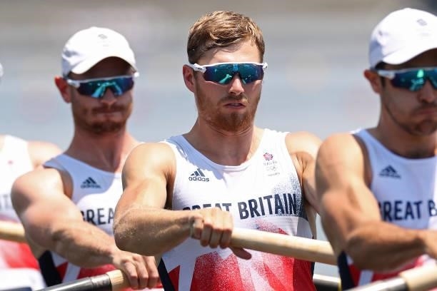 Matthew Rossiter, Rory Gibbs and Sholto Carnegie of Team Great Britain compete during the Men's Four Heat 2 on day one of the Tokyo 2020 Olympic...