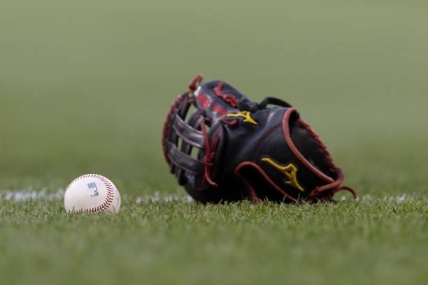 Ball and glove rest on the field prior to the game between the Atlanta Braves and Philadelphia Phillies at Citizens Bank Park on July 23, 2021 in...
