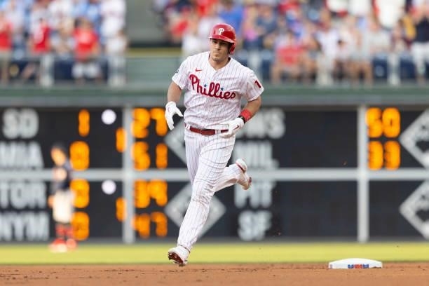 Realmuto of the Philadelphia Phillies rounds the bases after hitting a solo home run in the bottom of the first inning against the Atlanta Braves at...