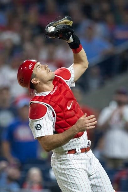 Realmuto of the Philadelphia Phillies catches the ball against the Atlanta Braves at Citizens Bank Park on July 23, 2021 in Philadelphia,...