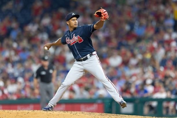Edgar Santana of the Atlanta Braves throws a pitch against the Philadelphia Phillies at Citizens Bank Park on July 23, 2021 in Philadelphia,...