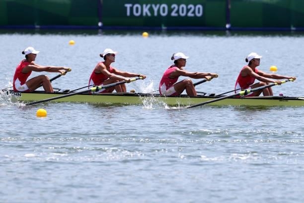 Xinyu Lin, Fei Wang, Miaomiao Qin and Shiyu Lu of Team China compete during the Women's Four Heat 1 on day one of the Tokyo 2020 Olympic Games at Sea...