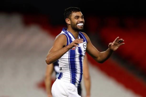 Tarryn Thomas of the Kangaroos celebrates a goal during the round 19 AFL match between Carlton Blues and North Melbourne Kangaroos s at Marvel...