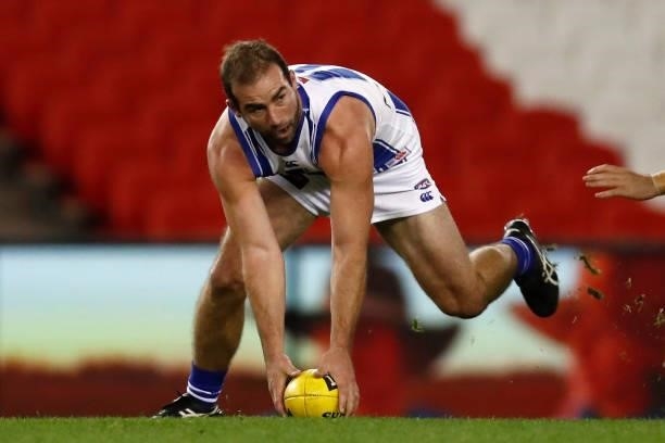 Ben Cunnington of the Kangaroos gathers the ball during the round 19 AFL match between Carlton Blues and North Melbourne Kangaroos s at Marvel...