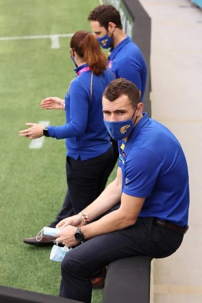 Luke Shuey of the Eagles looks on as players warm up before the round 19 AFL match between West Coast Eagles and St Kilda Saints at Optus Stadium on...