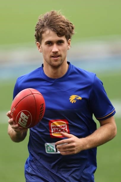 Connor West of the Eagles jogs from the field following the warm up session during the round 19 AFL match between West Coast Eagles and St Kilda...